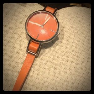 Orange wrapped around band fashion watch